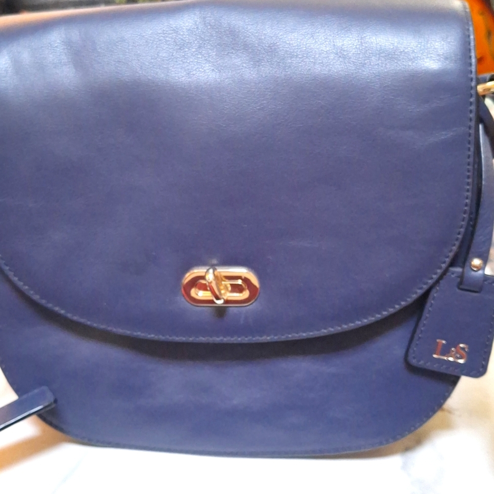 Used (in great condition) Lo & Sons camera bag